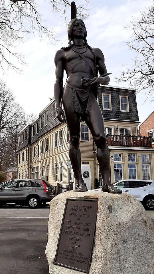 The bronze statue of Massasoit on a granite boulder, with a plaque naming him Great Sachem of the Wampanoags